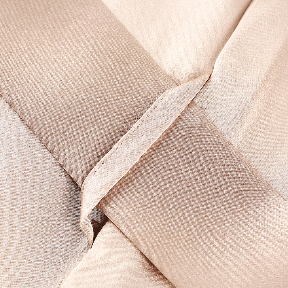 Belt loop and waist sash detail on champagne silk robe