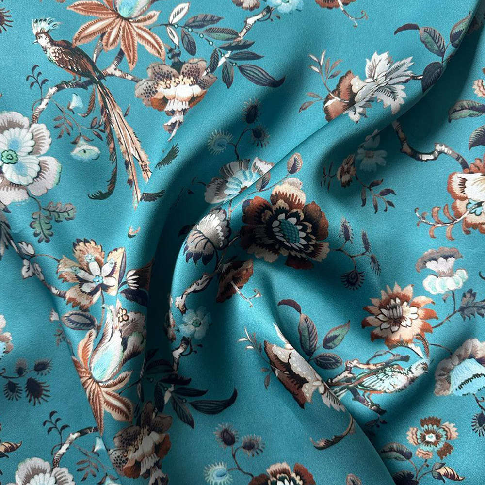 Vintage floral printed mulberry silk fabric detail showing lustrous texture