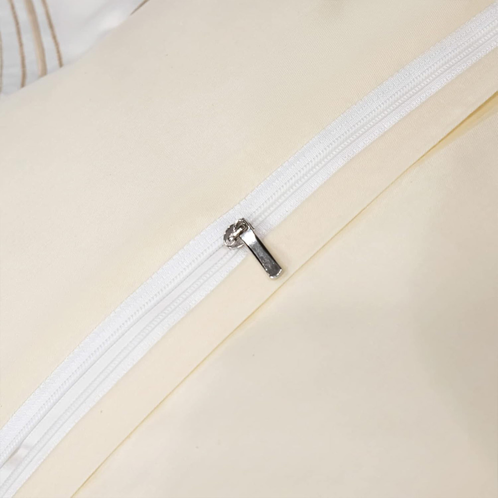 Hidden zipper detail on cream silk duvet cover
