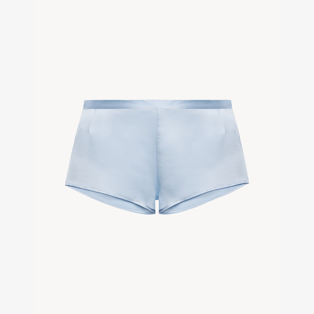 Light blue silk pajama shorts flat lay