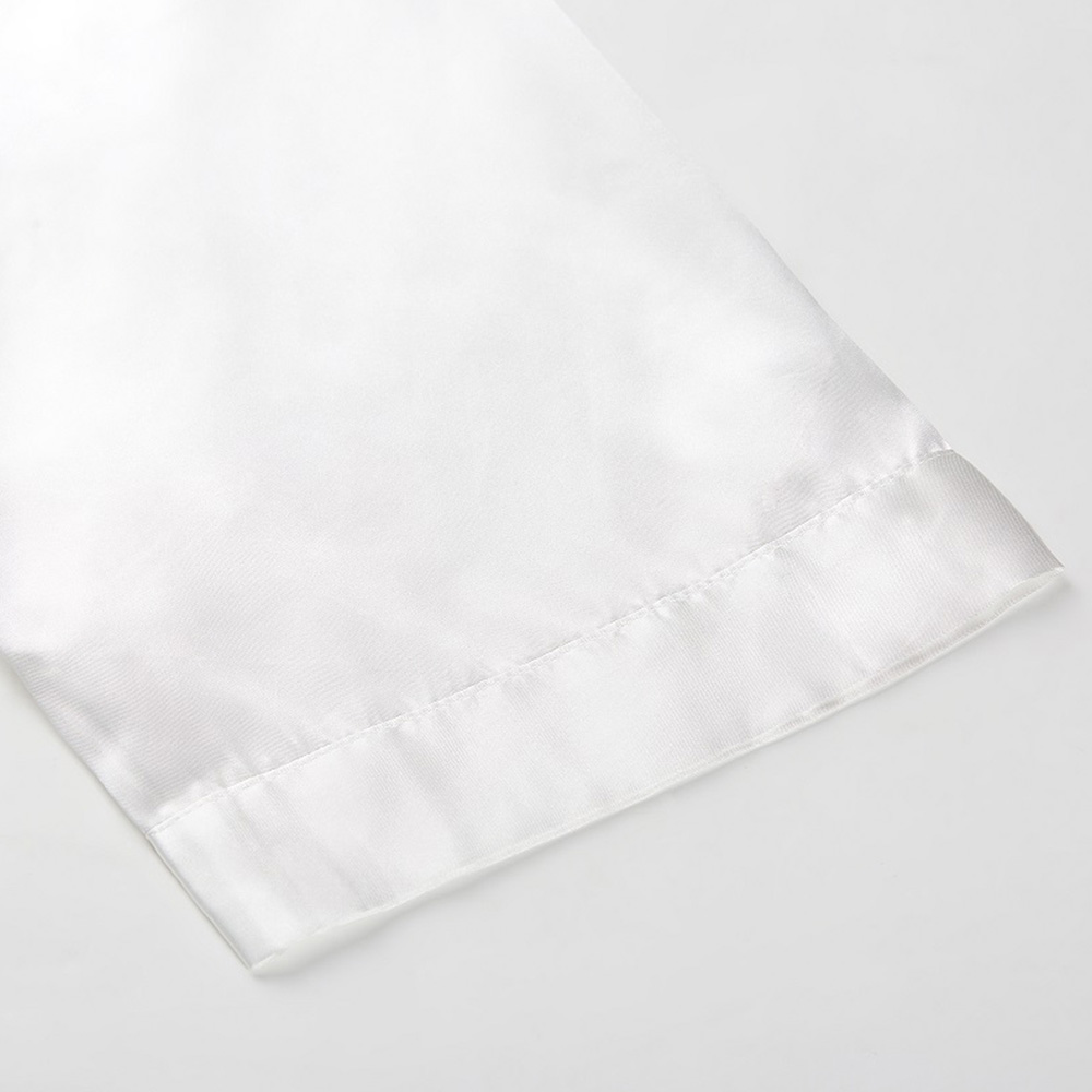 Hem stitching close up of white silk kimono robe